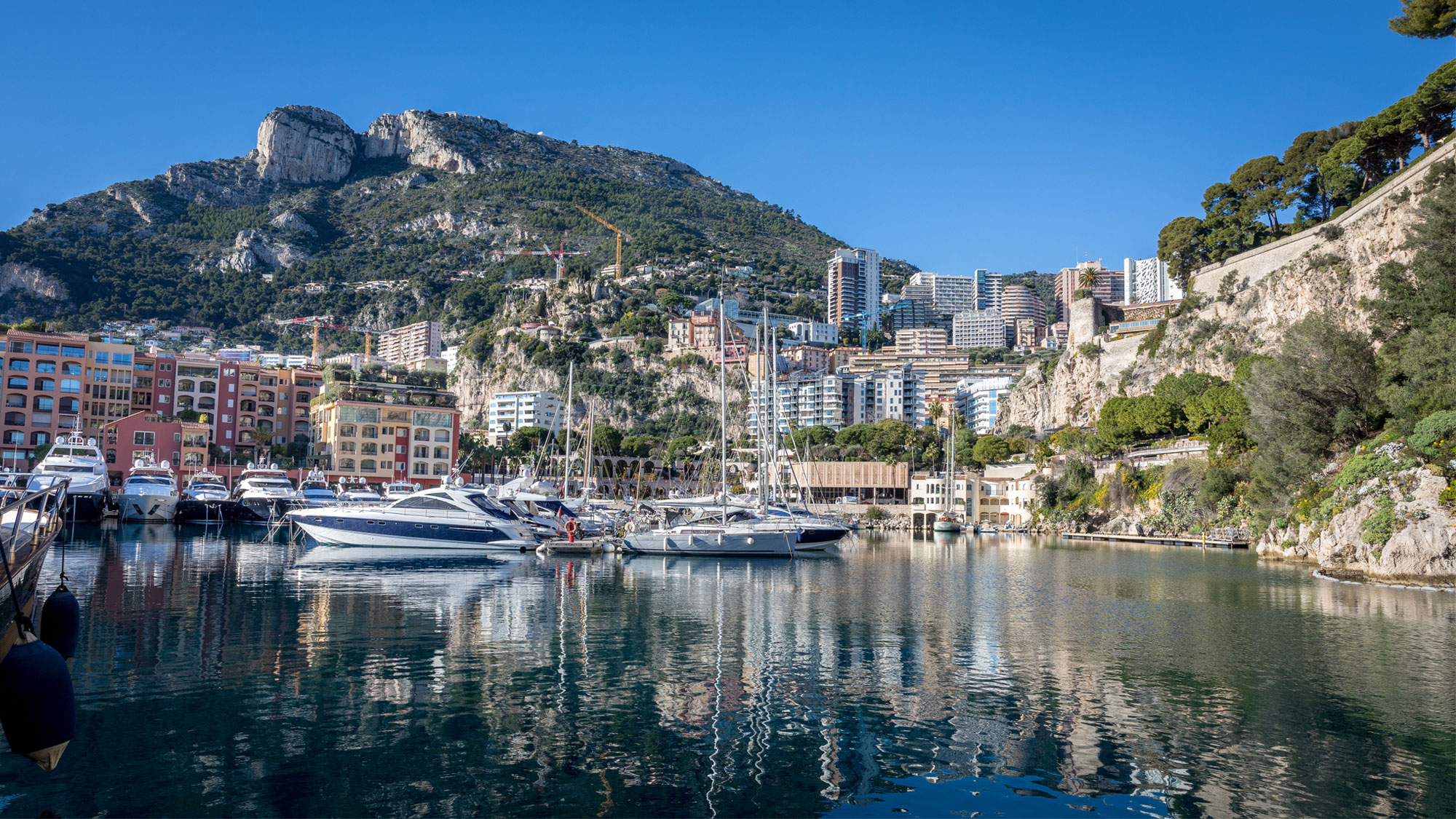 Monaco property in marina in Fontvieille Monaco with yachts in the background